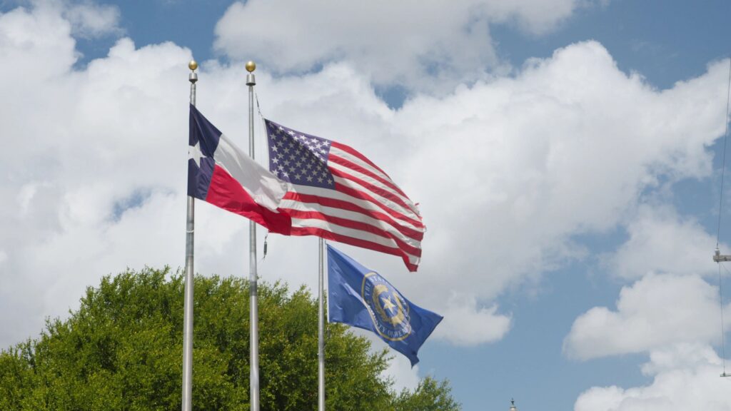 American Flag, Texas State Flag, and County Flag in Laredo, Texas